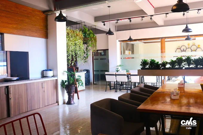 CMS Cafe interior and coffee service in Kathmandu